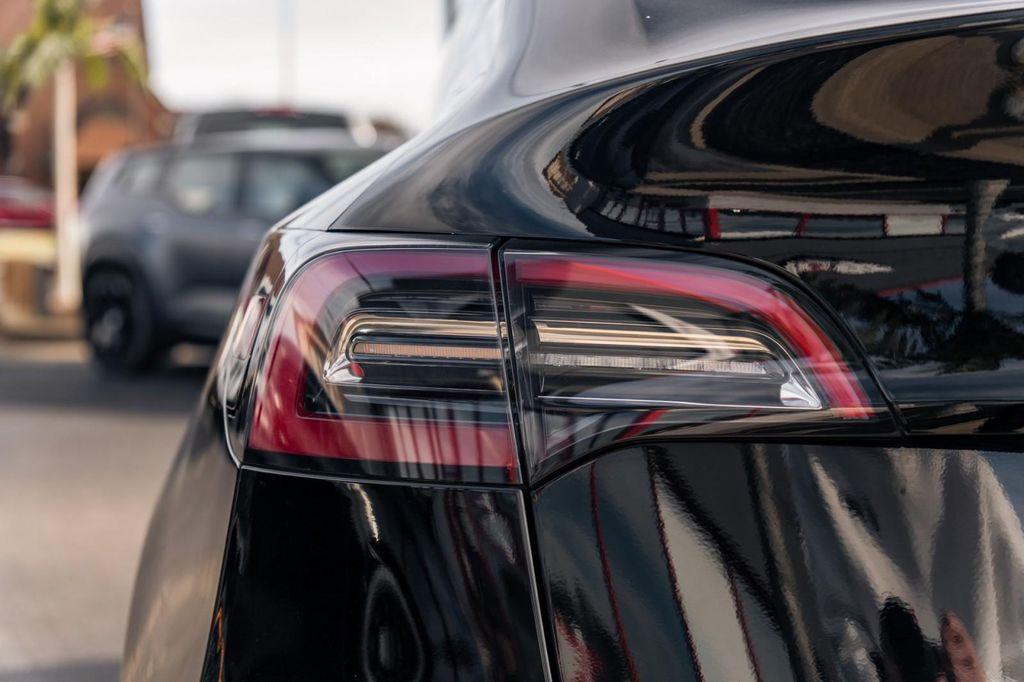 used 2021 Tesla Model Y car, priced at $26,900