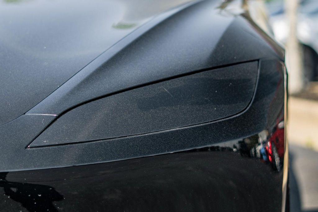 used 2024 Tesla Model 3 car, priced at $35,900