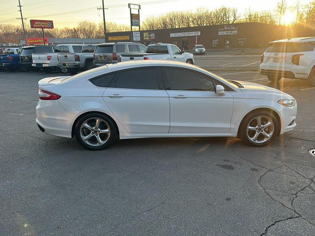 used 2016 Ford Fusion car, priced at $11,990