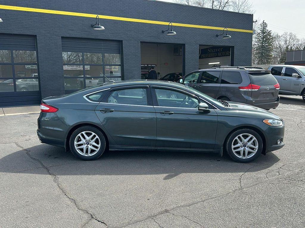 used 2015 Ford Fusion car, priced at $9,990
