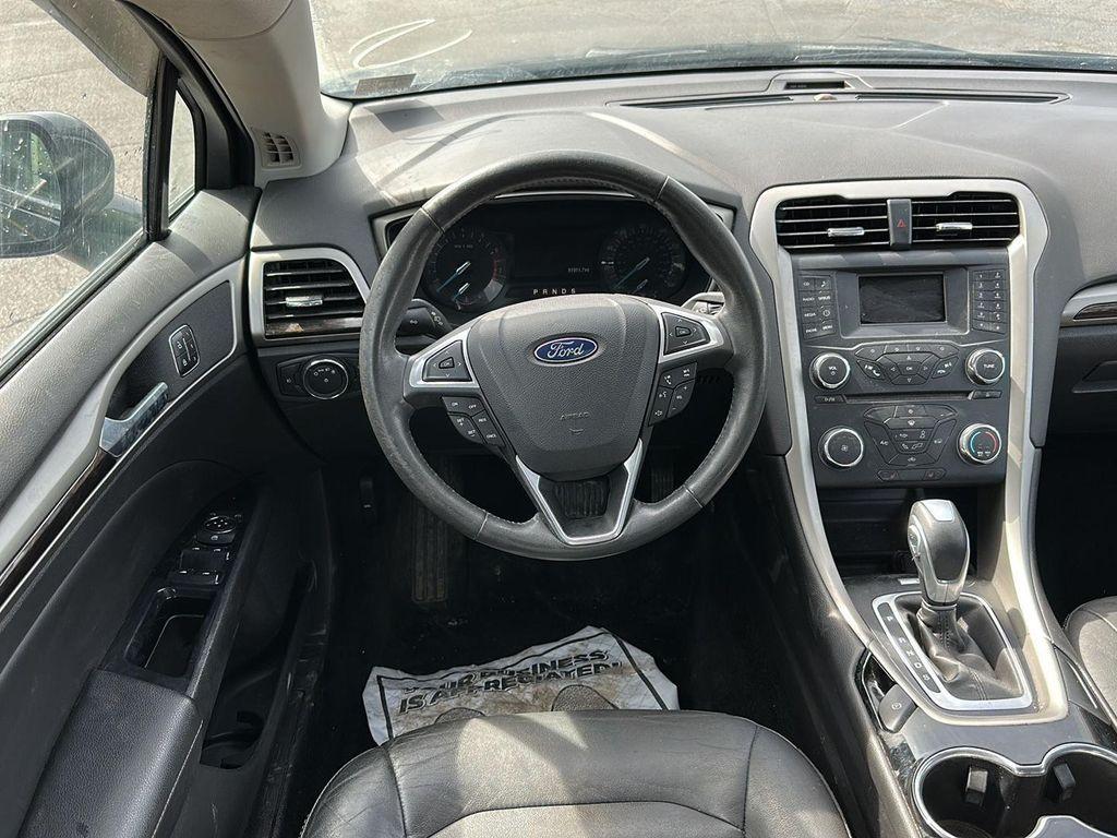 used 2015 Ford Fusion car, priced at $9,990