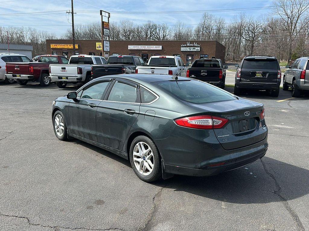 used 2015 Ford Fusion car, priced at $9,990