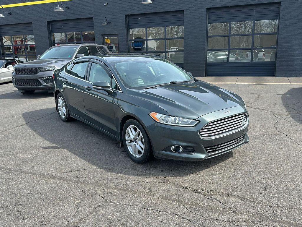 used 2015 Ford Fusion car, priced at $9,990