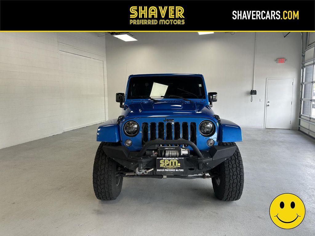 used 2015 Jeep Wrangler Unlimited car, priced at $30,241