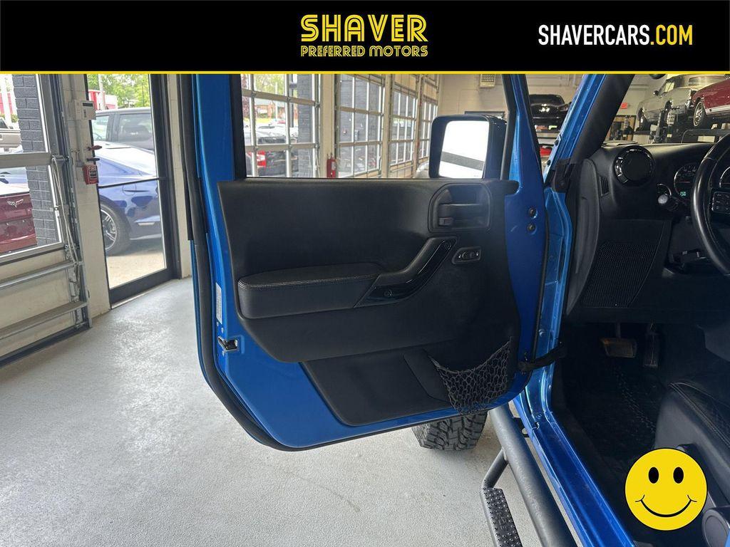 used 2015 Jeep Wrangler Unlimited car, priced at $30,241