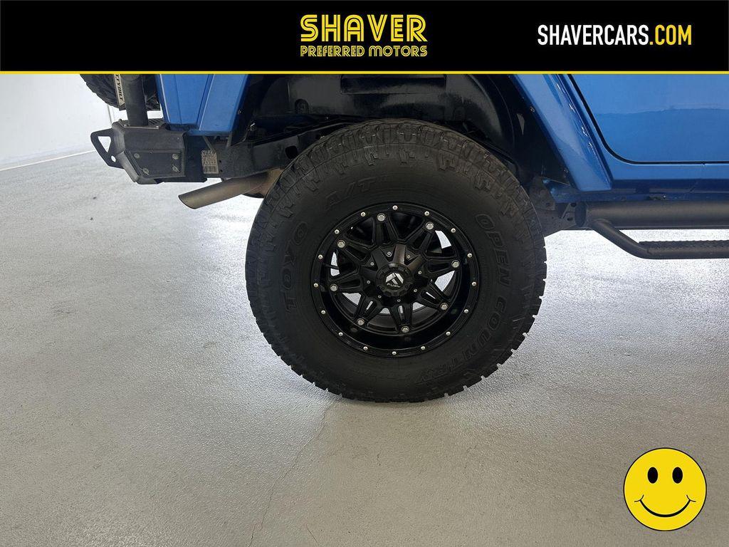 used 2015 Jeep Wrangler Unlimited car, priced at $30,241