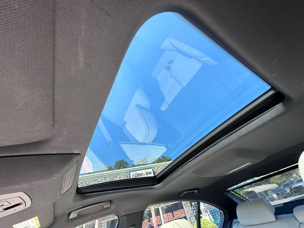 used 2015 BMW 740 car, priced at $15,900