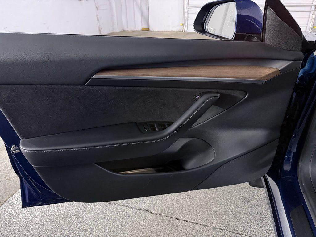 used 2023 Tesla Model 3 car, priced at $31,500