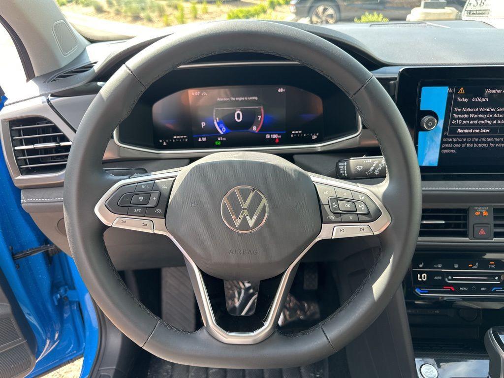 new 2025 Volkswagen Taos car, priced at $29,008