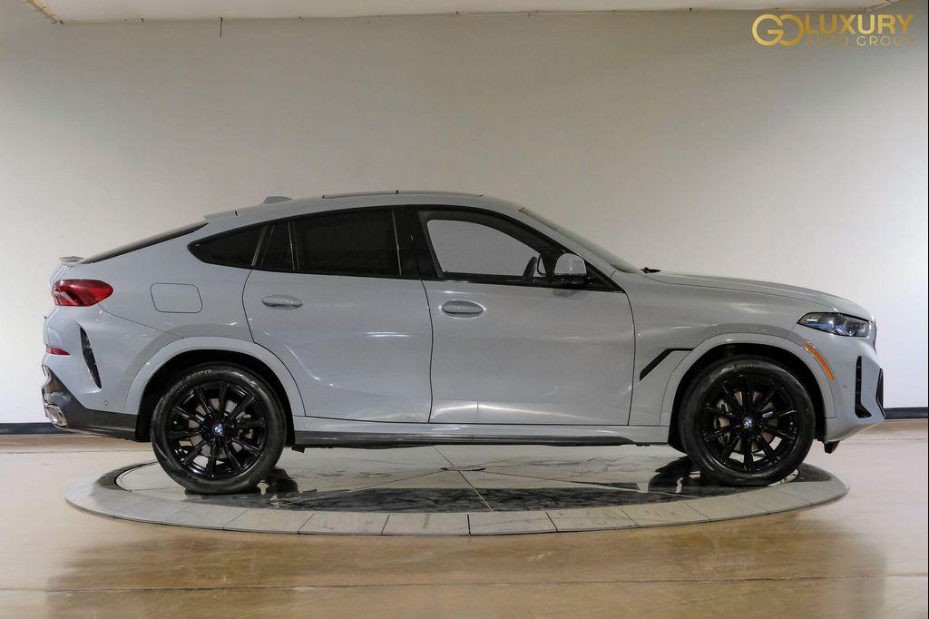 used 2025 BMW X6 car, priced at $61,998