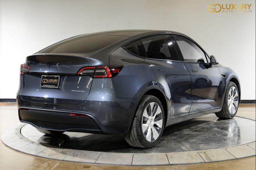 used 2023 Tesla Model Y car, priced at $35,638