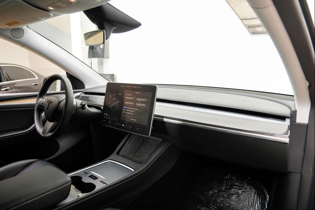 used 2023 Tesla Model Y car, priced at $35,638