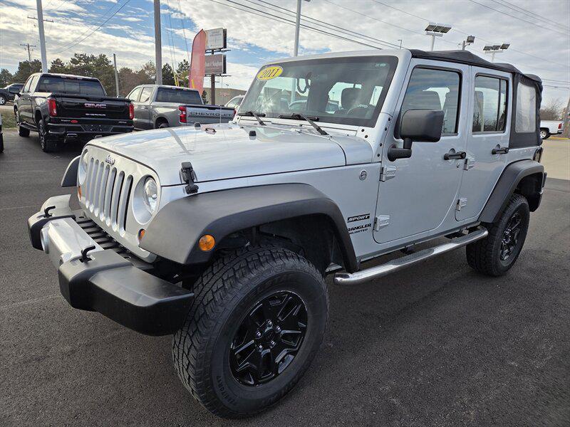 used 2011 Jeep Wrangler Unlimited car, priced at $11,995