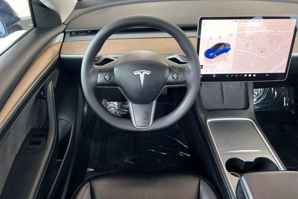 used 2023 Tesla Model 3 car, priced at $25,977