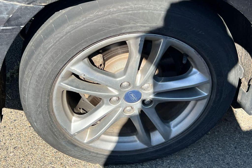 used 2015 Ford Fusion Hybrid car, priced at $12,999