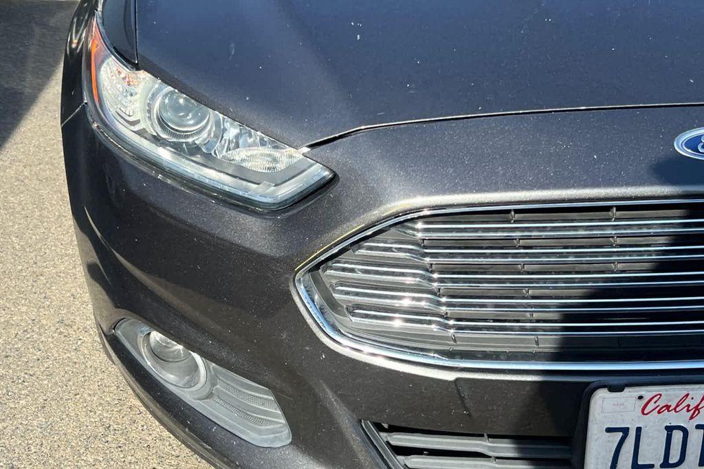 used 2015 Ford Fusion car, priced at $10,999