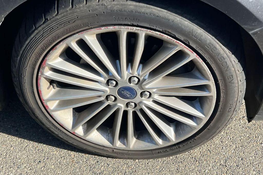 used 2015 Ford Fusion car, priced at $10,999