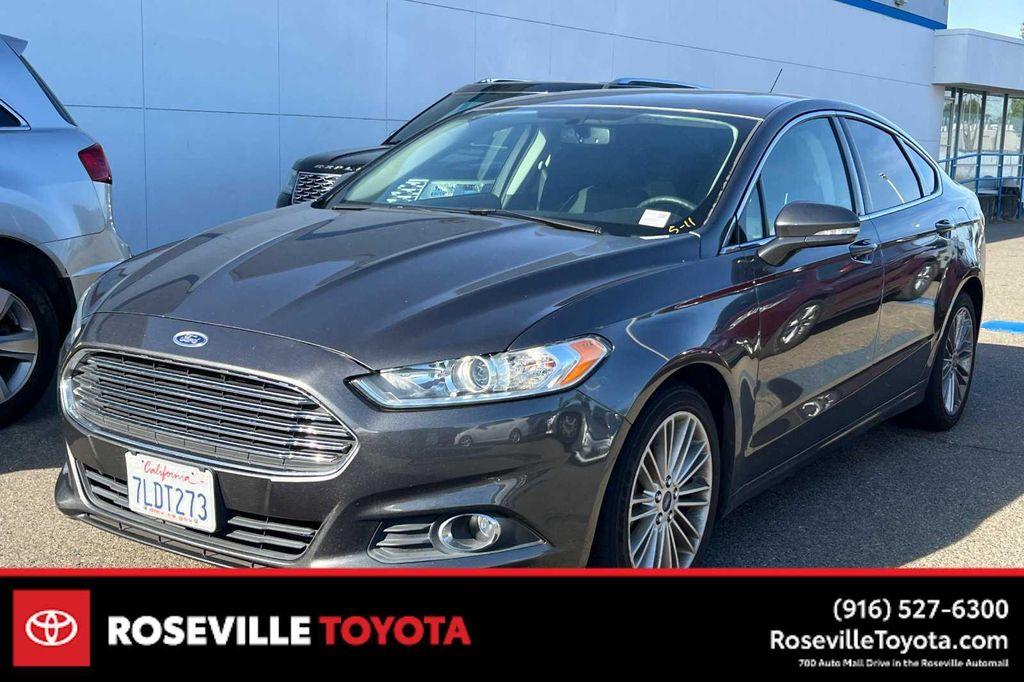 used 2015 Ford Fusion car, priced at $10,999