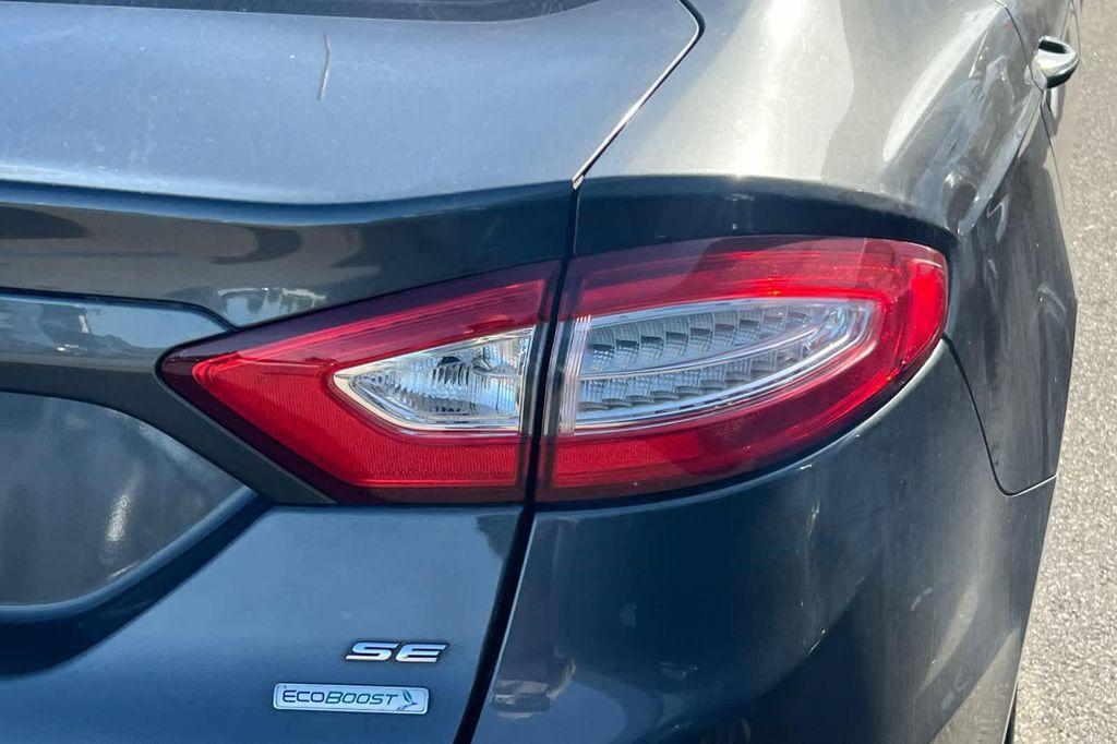 used 2015 Ford Fusion car, priced at $10,999