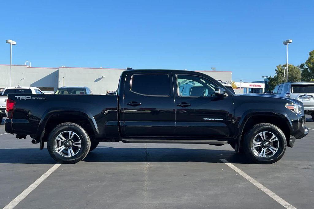 used 2018 Toyota Tacoma car, priced at $25,977
