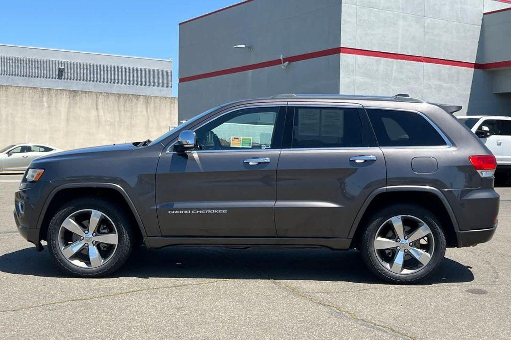used 2014 Jeep Grand Cherokee car, priced at $14,999