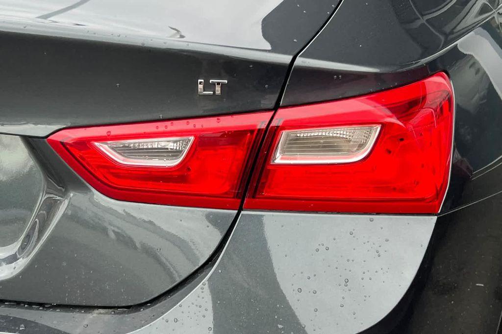 used 2018 Chevrolet Malibu car, priced at $12,084