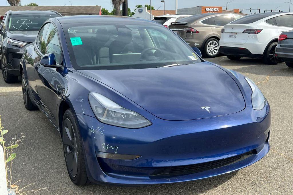 used 2023 Tesla Model 3 car, priced at $27,999