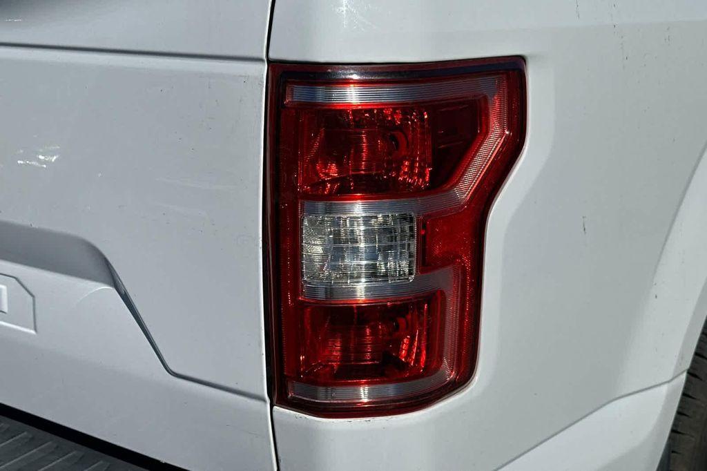 used 2018 Ford F-150 car, priced at $15,999