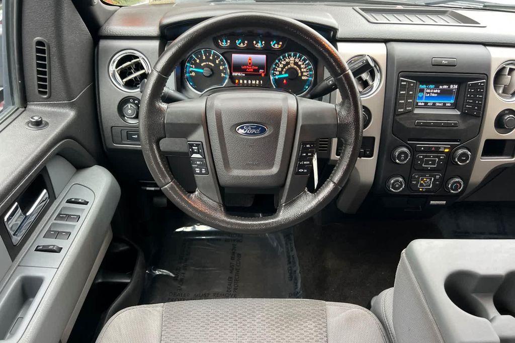used 2014 Ford F-150 car, priced at $9,977