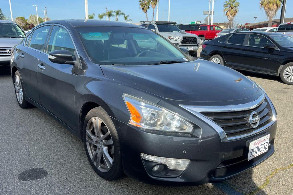 used 2015 Nissan Altima car, priced at $9,999