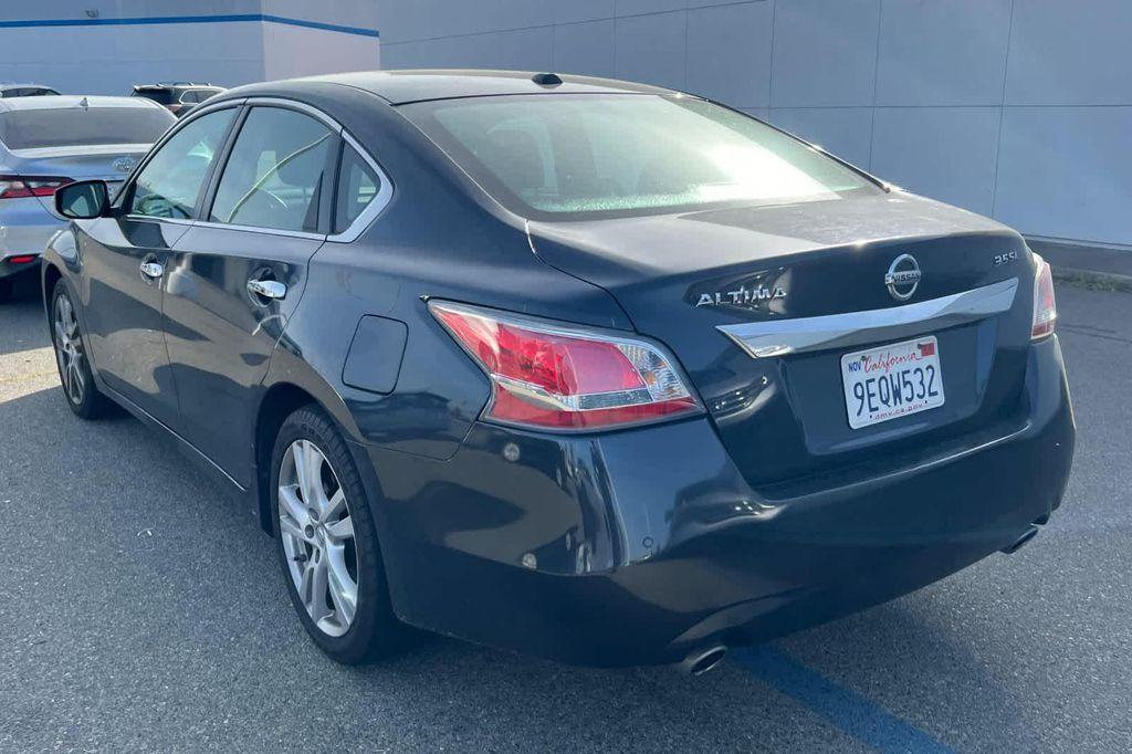 used 2015 Nissan Altima car, priced at $9,999