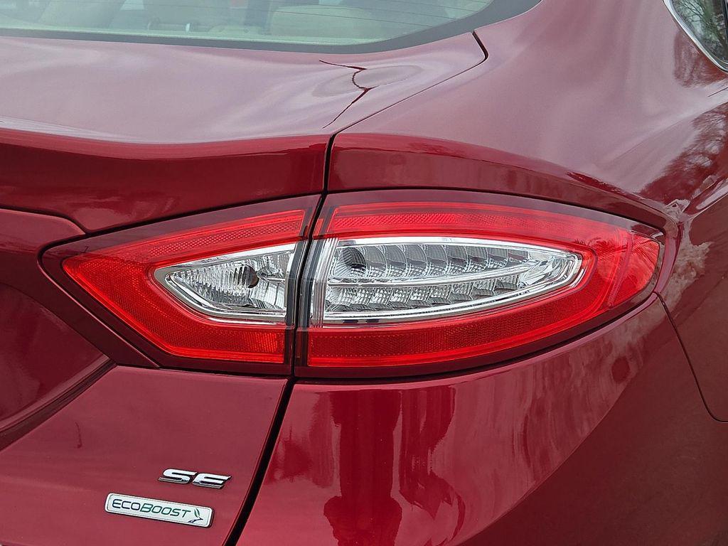 used 2014 Ford Fusion car, priced at $7,977