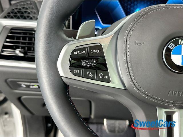 used 2025 BMW X5 car, priced at $82,194