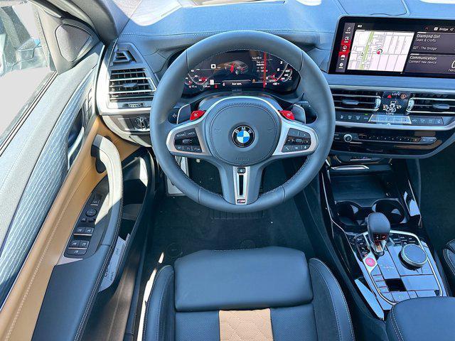 used 2025 BMW X4 M car, priced at $79,596