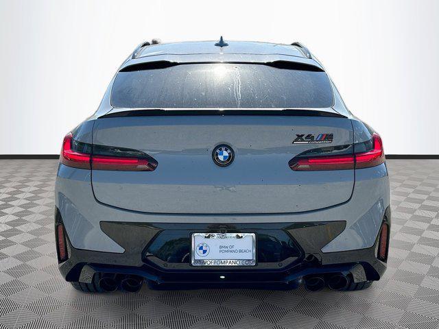used 2025 BMW X4 M car, priced at $79,596