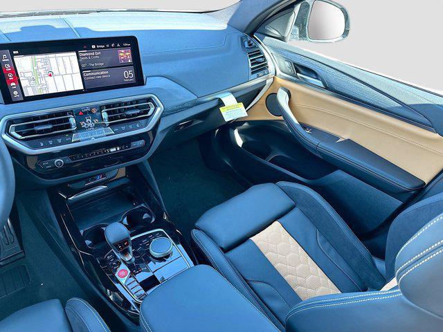 used 2025 BMW X4 M car, priced at $79,596