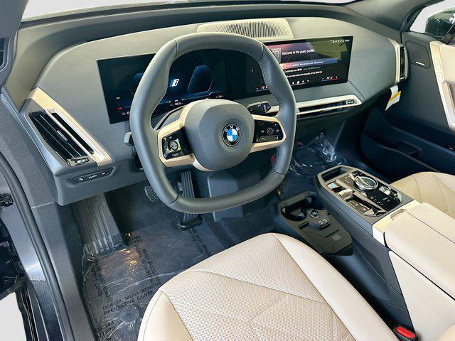 new 2026 BMW iX car, priced at $87,525