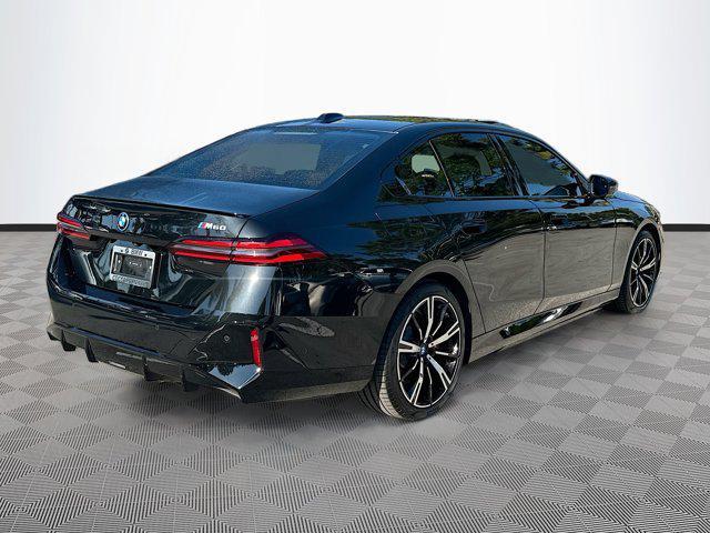 used 2024 BMW i5 car, priced at $54,994