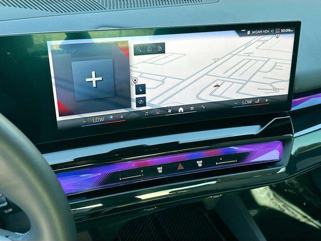 used 2024 BMW i5 car, priced at $54,994