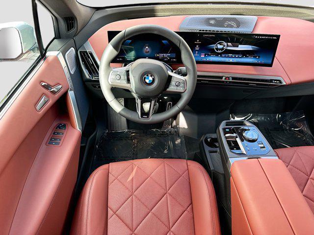 new 2026 BMW iX car, priced at $106,850