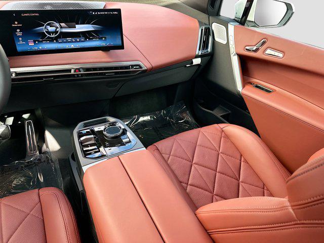 new 2026 BMW iX car, priced at $106,850