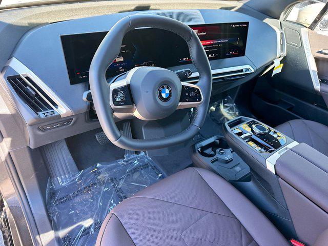 new 2026 BMW iX car, priced at $84,675