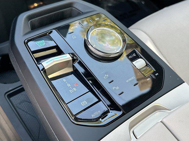 used 2025 BMW iX car, priced at $57,242