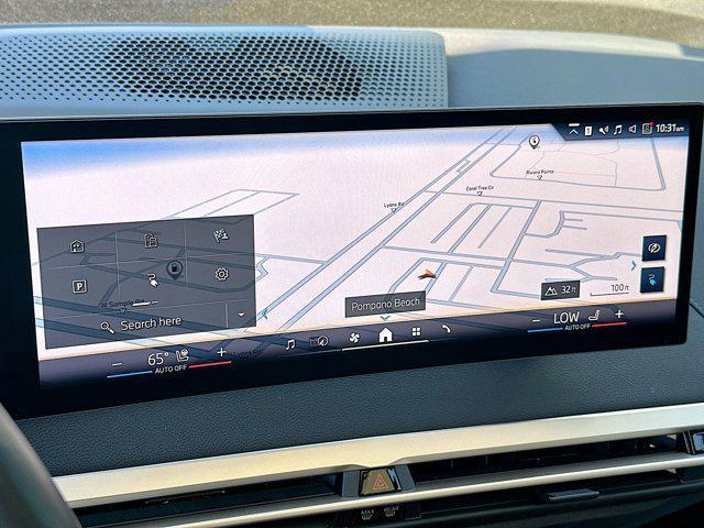 used 2025 BMW iX car, priced at $57,242