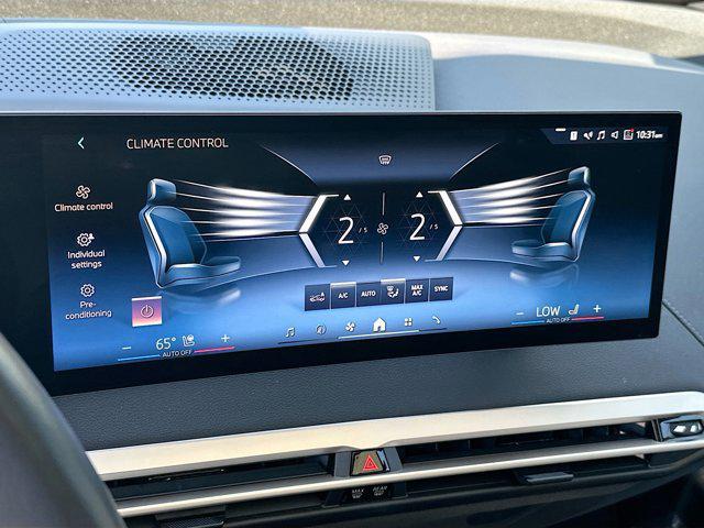 used 2025 BMW iX car, priced at $57,242