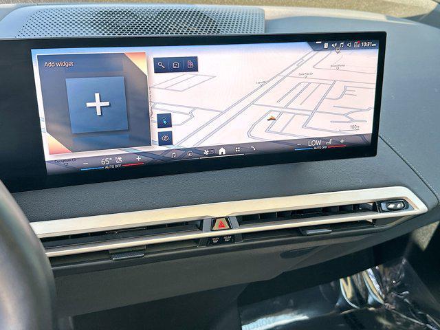 used 2025 BMW iX car, priced at $57,242