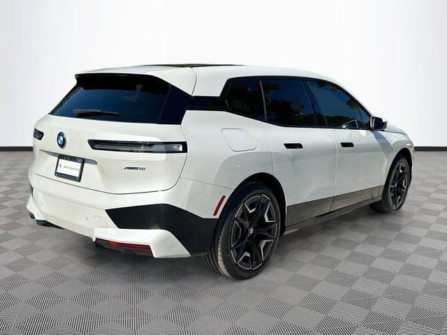 used 2025 BMW iX car, priced at $57,242