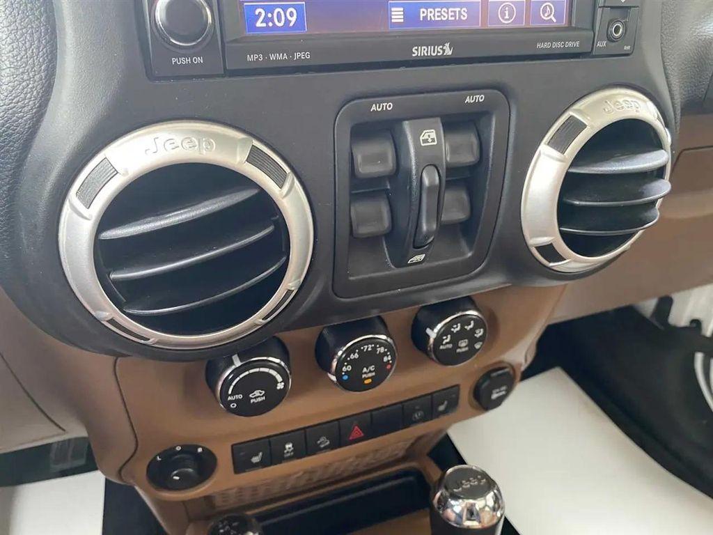 used 2013 Jeep Wrangler Unlimited car, priced at $20,978