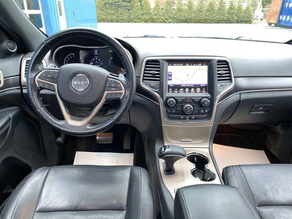 used 2014 Jeep Grand Cherokee car, priced at $9,856