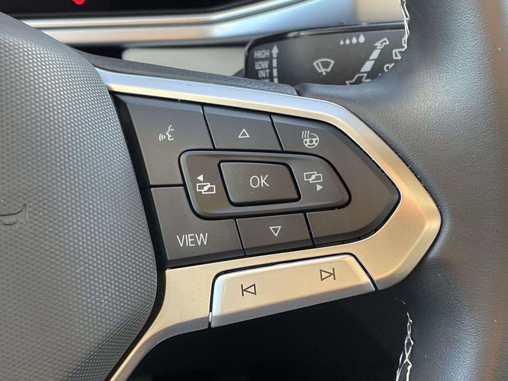 used 2025 Volkswagen Taos car, priced at $22,908